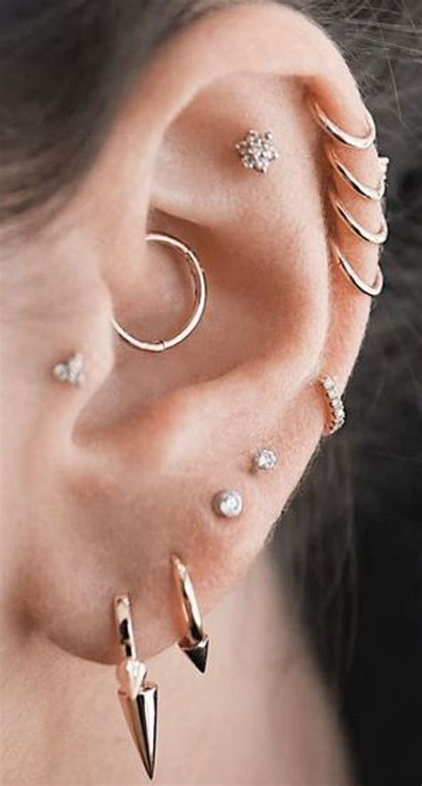 pretty ear piercing ideas multiple combinations cartilage helix daith ...