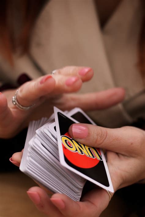 What does shuffle hands mean in UNO? - Tabletop Game Planet