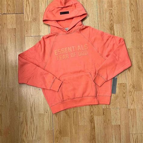 Fear of God Essentials Coral relaxed hoodies (NO... - Depop