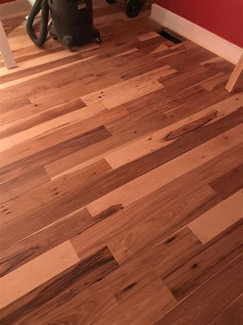 Natural wide plank Hickory hardwood floor installed by Snhwoodworks LLC ...