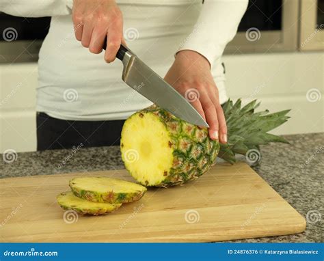 Cutting a pineapple stock photo. Image of ripe, healthy - 24876376