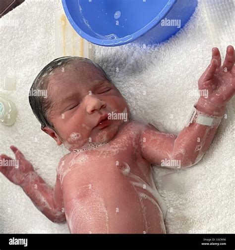 Babys first bath hi-res stock photography and images - Alamy