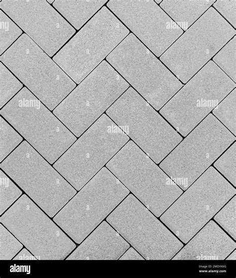 Top view of a gray brick outdoor flooring in a zig zag pattern Stock ...