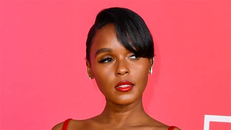 Janelle Monae fans go wild as she shows off her bare boobs in soaking ...