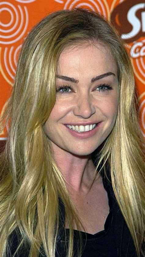 Download Portia De Rossi Smiling Event Portrait Wallpaper | Wallpapers.com