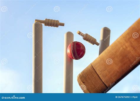 Cricket Ball Hitting Wicket Stumps Knocking Bails Out Stock Photo ...