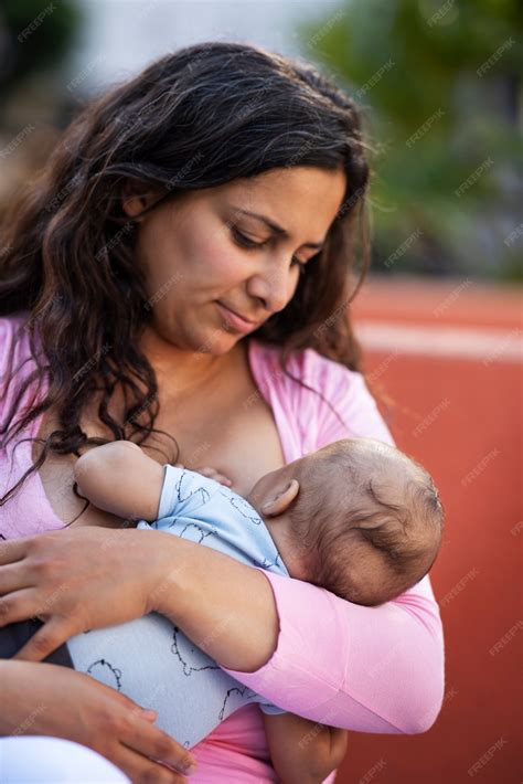 Woman Breastfeeding Husband