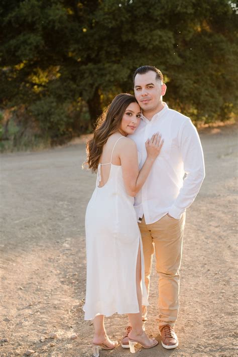 Bride in a white satin dress for her engagement session | Engagement ...