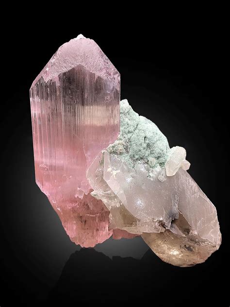 Pale Pink Kunzite double Terminated associates with Quartz. Quartz is also DT, without any ...
