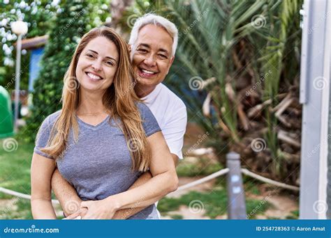 Middle Age Hispanic Couple of Husband and Wife Together on a Sunny Day Outdoors Stock Image ...