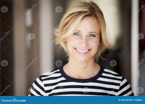 Active Mature Woman Smiling at the Camera Stock Photo - Image of ...