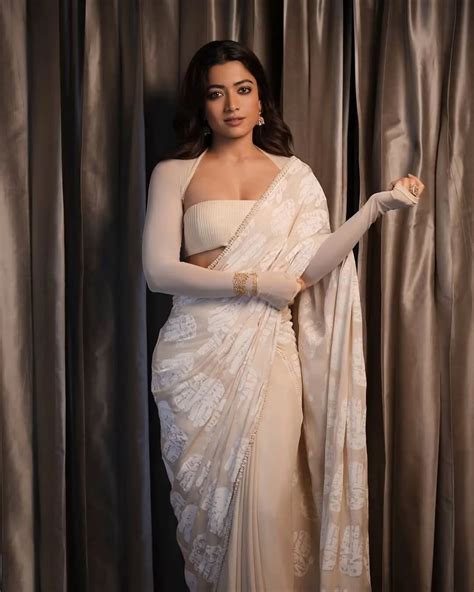 Rashmika Mandanna's Stunning Glamour in a Cream Saree: Exquisite Photoshoot - Filmibeat