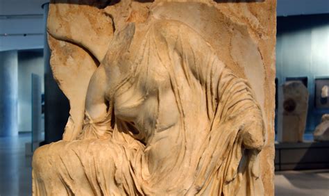 Nike Adjusting Her Sandal (detail). From the south side of the parapet ...