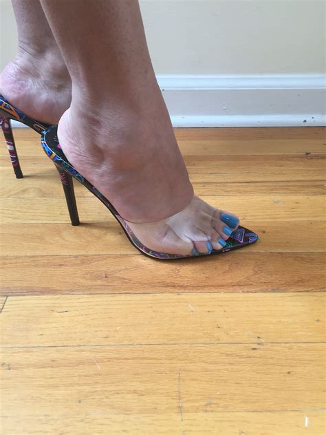 Clear open toe slip on high heel with graffiti accent bottom. Simple ...