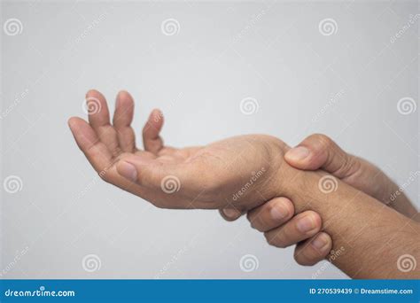 Man Holding Hands with Aching Wrist Stock Image - Image of human, aching: 270539439
