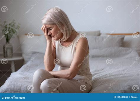 Aged Woman Feels Unwell Suffers from Barometric Pressure Headache Stock ...