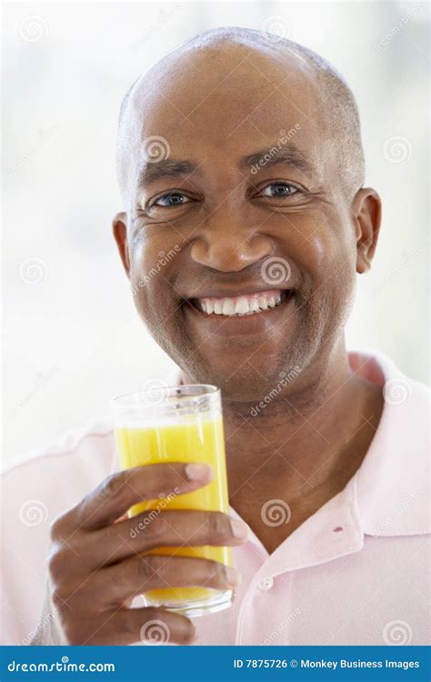 Middle Aged Man Drinking Fresh Orange Juice Stock Photo - Image of ...