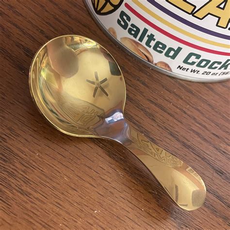 Golden Peanut Serving Spoon | Hancock Peanut Company