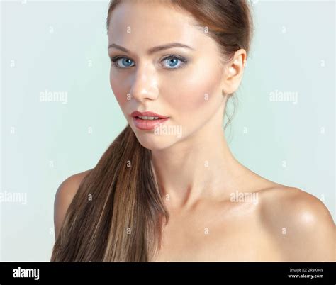 Fashion portrait of beautiful young woman with long brown hair. Natural ...