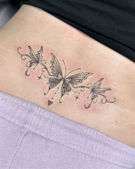 Kelly Chen 🌷 on Instagram: "Dainty butterfly tramp stamp for Andra 🫧 ...