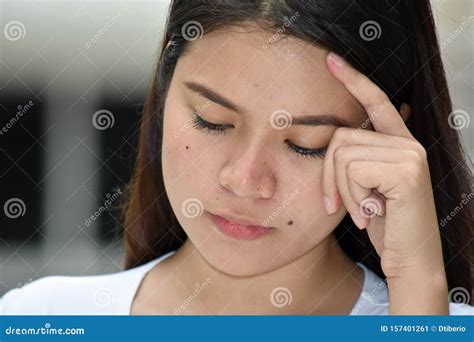 A Sad Minority Female stock image. Image of solemn, minority - 157401261
