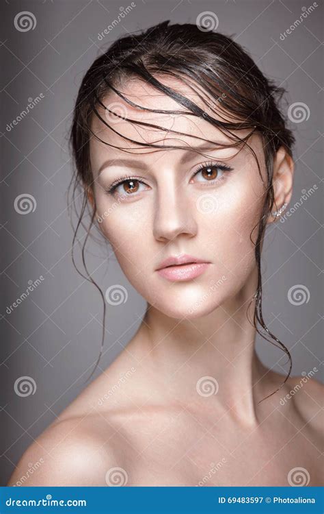Portrait of Young Beautiful Nude Woman with Wet Shining Makeup on Grey ...