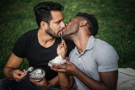 Two Men Kissing and Sharing an Ice Cream - Photos by Canva