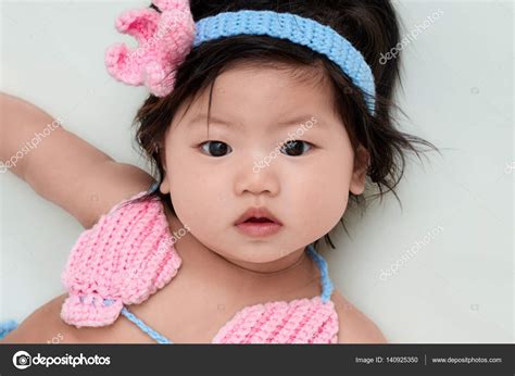 Cute Asian Chinese baby girl Stock Photo by ©hollanddog@gmail.com 140925350