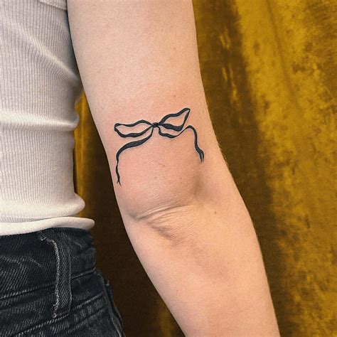 Bow tattoo meaning - Calaverastattoos.com