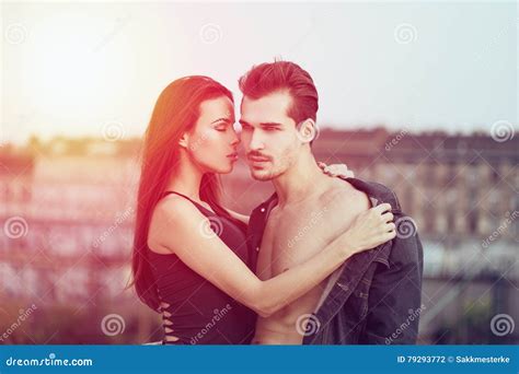 Sensual Brunette Woman Seduce Man in Sunset Stock Photo - Image of ...