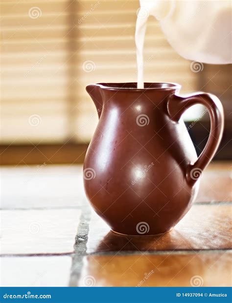 Jug of milk stock photo. Image of swirl, spilling, beverage - 14937094