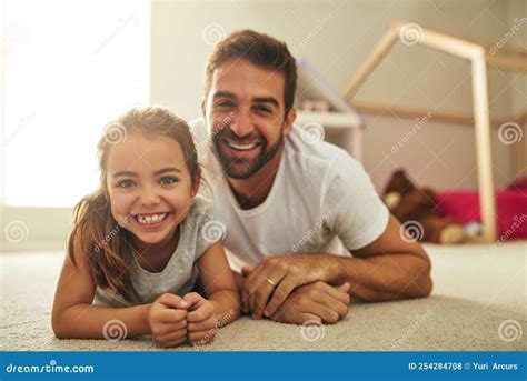 Daddys Little Girl. Portrait of a Handsome Young Man and His Daughter ...