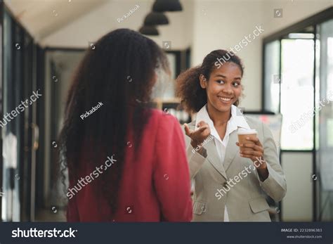 Two American Women Working Together Office Stock Photo 2232896383 ...