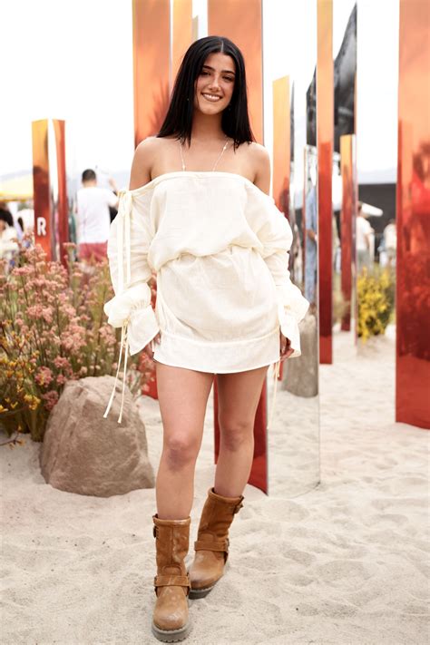 Charli D'Amelio Goes Sheer in Lace Top for Coachella 2025