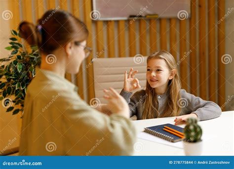 Mom Communicates with the Child Girl in Sign Language Stock Photo ...