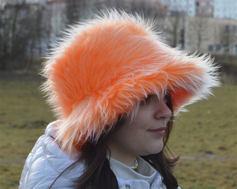 Peach faux fur bucket hat. Festival fuzzy neon hat. Peach fl | Inspire ...