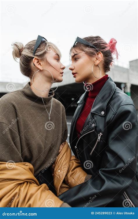 Two Beautiful Young Lesbian Girls in Fashionable Clothes with Leather ...