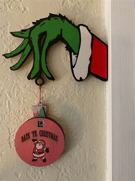 How the Grinch Stole Christmas Grinch’s Hand Holding an Ornament ...