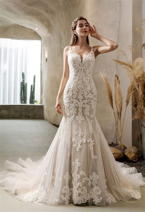 5. Fit and flare lace wedding dress - Heavenly Wedding Belles