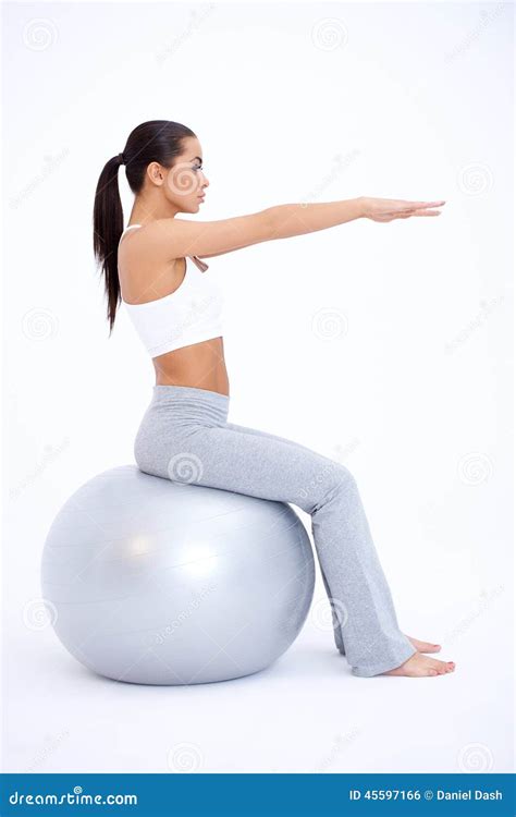 Fit Woman Sitting on Big Exercise Ball Stock Photo - Image of sport ...