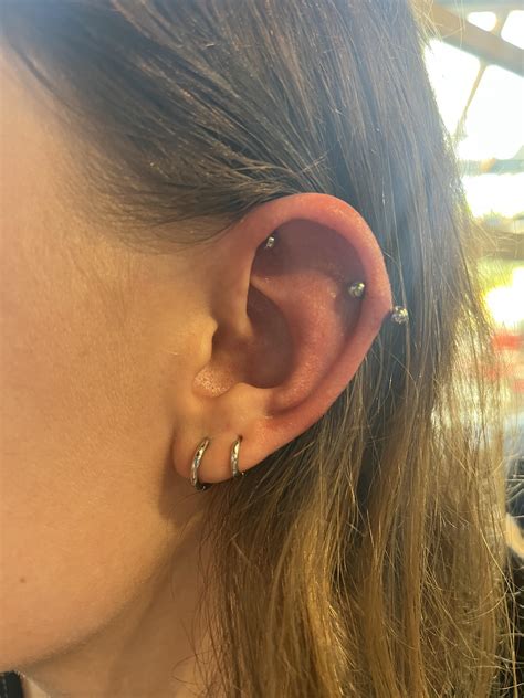 Healing tips for a double helix pierced with a gun : r/piercing