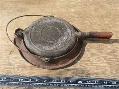 antique Canadian made cast iron waffle maker - Schmalz Auctions