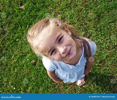 Little girl looking up stock photo. Image of camera, cheerful - 35485194