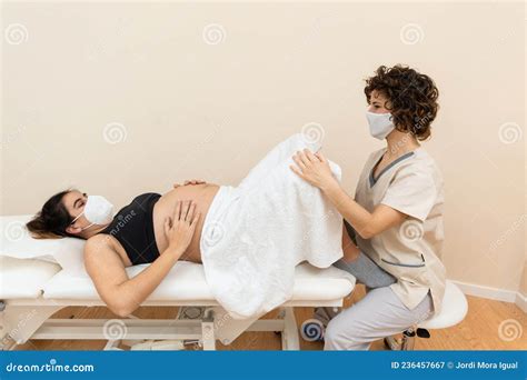 Gynecologist Examining and Performing Pelvic Floor Treatment on ...