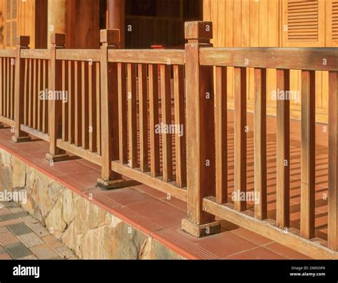 A freshly painted and stained wood deck with railing. Deck railing ...