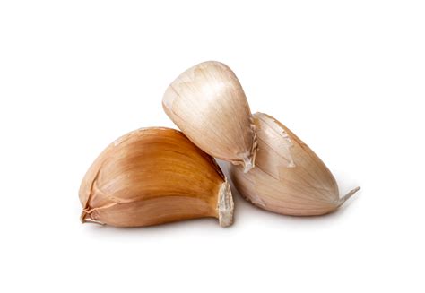 Fresh three garlic cloves in stack isolated with clipping path in png ...