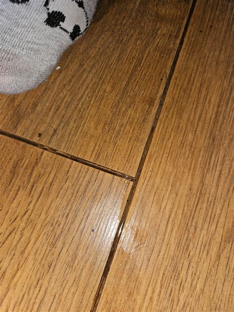 Poor installation has caused water to leak under vinyl flooring : r/Costco