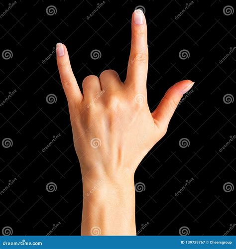 Female Hand Showing Rock N Roll Sign or Giving the Devil Horns Gesture ...