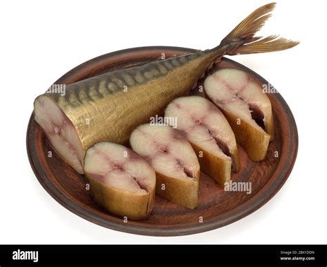 Cold smoked mackerel fish in a plate isolated on white background Stock ...