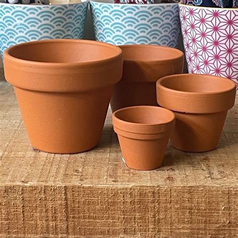 POTS & PLANTERS – Howbert & Mays
